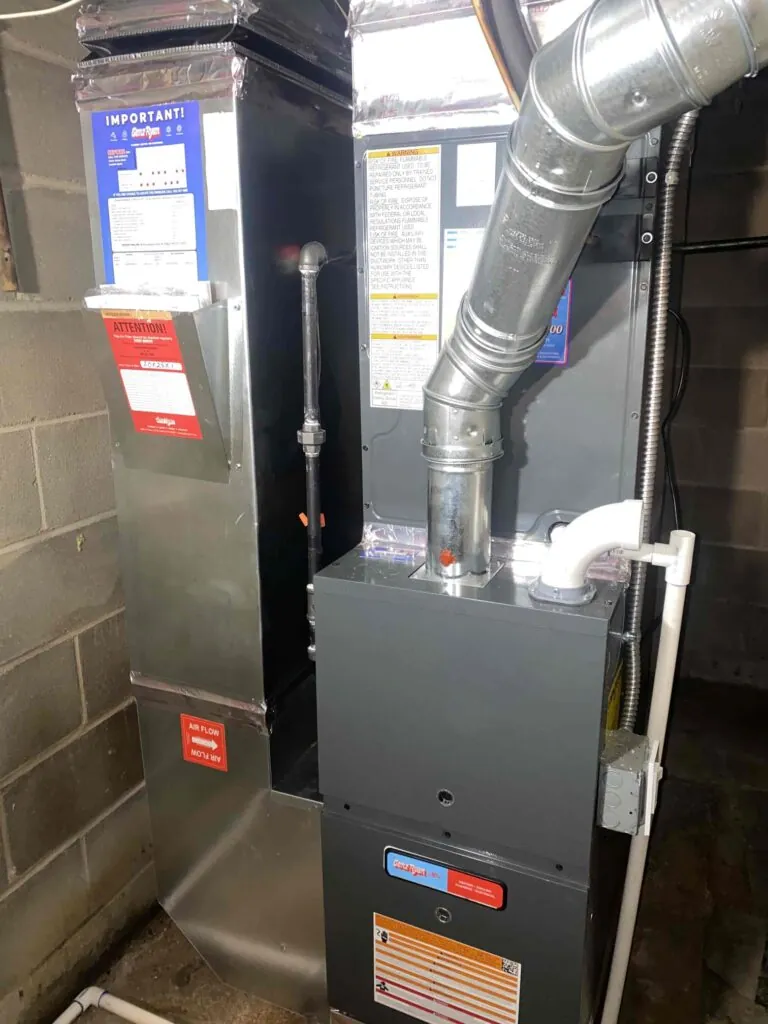 Gas furnace and ductwork in a St. Paul, MN basement during repair local furnace repair near me.