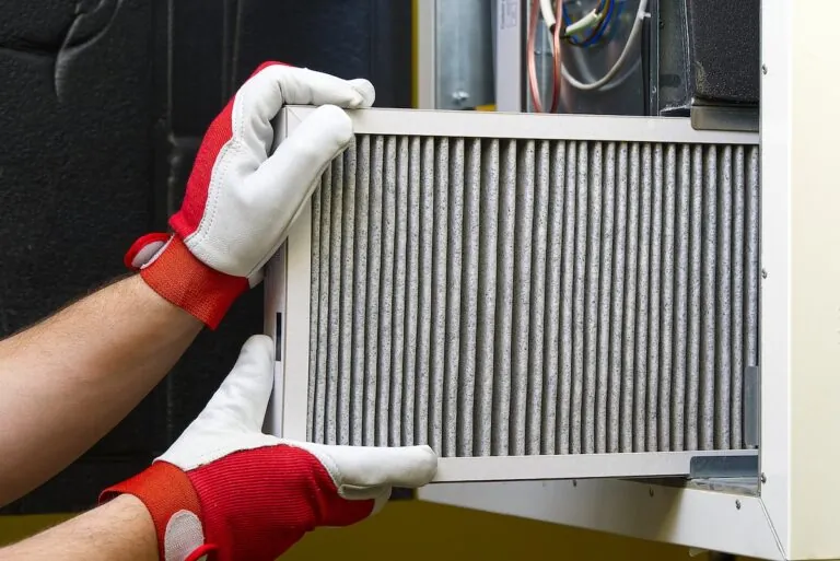 Replacing the filter in the central ventilation system.