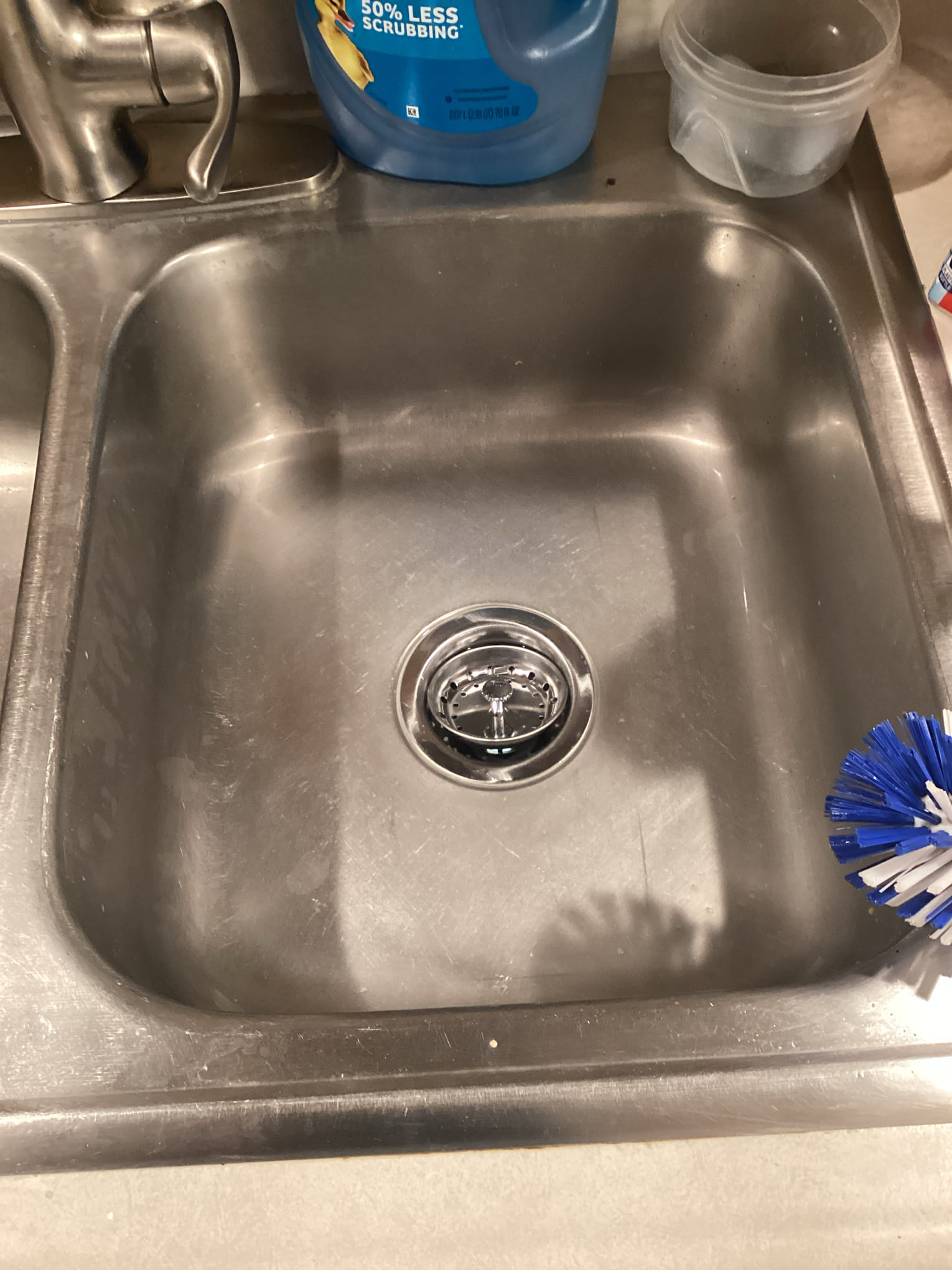 Clean stainless steel sink with drain strainer kitchen drain cleaning Twin Cities