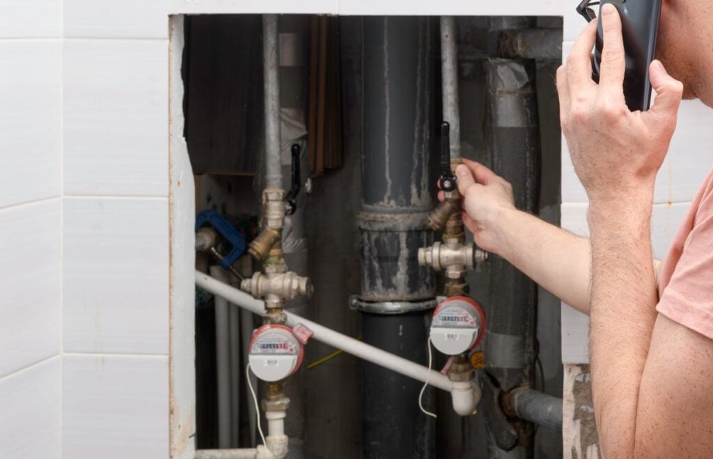 man checking the check valve