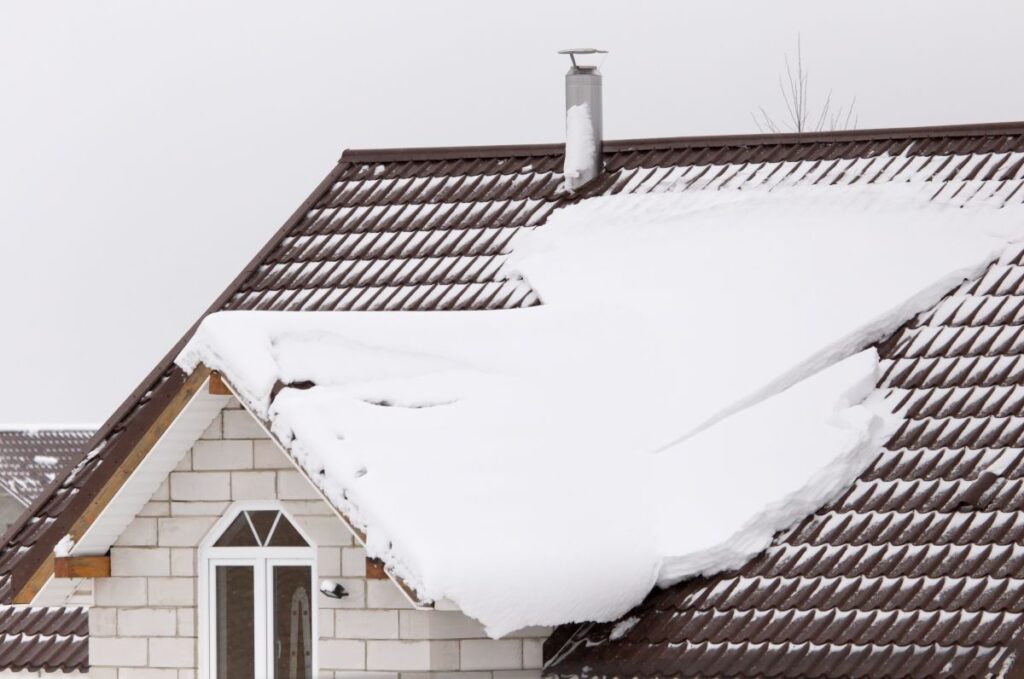 Snow on the roof of the house