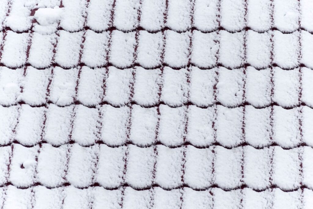 snowy texture on a tile roof