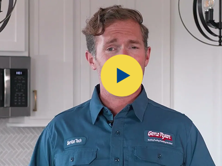 Video thumbnail: a male service technician in a blue uniform with 'Service Tech' patch, in a kitchen with appliances visible, facing the camera.