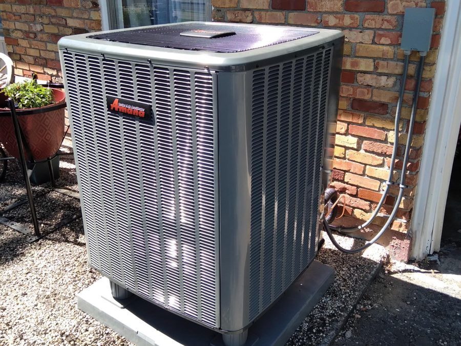 AC unit installed outside home.
